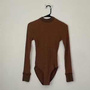 Urban Outfitters body suit. Never worn. Striped. Size S. One piece.